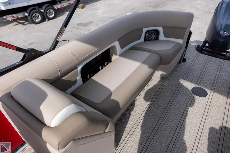 Slide: The Image of Premier 250 Solaris RF 2025 boat interior with beige seating and speaker system. - 7