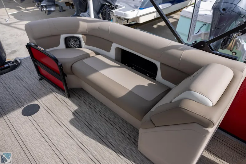 Slide: The Image of 2025 Premier 250 Solaris RF boat seating area with beige upholstery and modern design. - 8