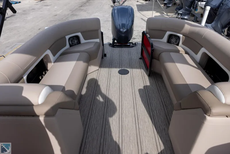 Slide: The Image of 2025 Premier 250 Solaris RF boat interior with beige seating and modern design. - 9