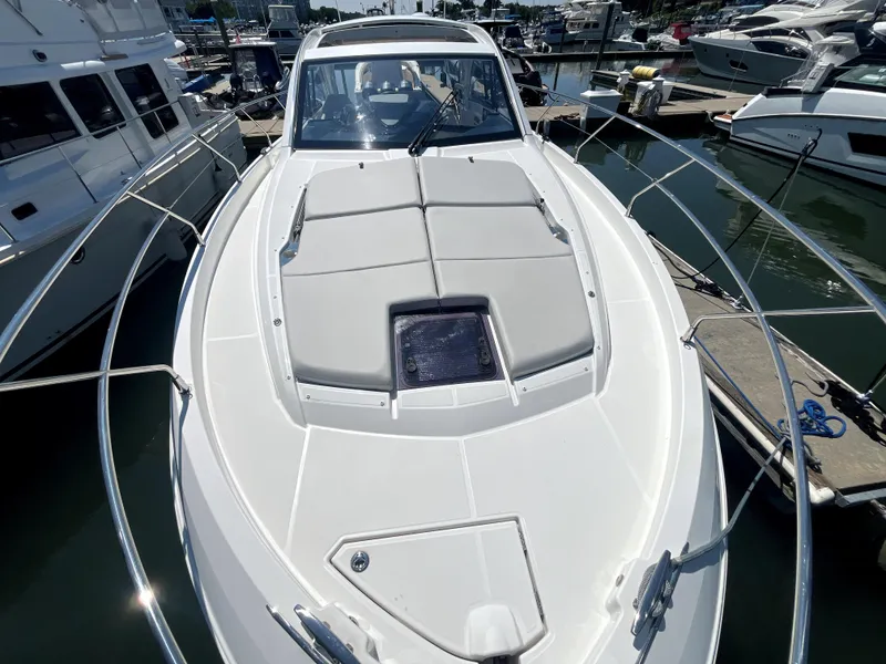 Slide: The Image of 2023 Beneteau Gran Turismo 41 yacht docked at marina. - 14