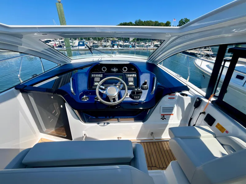 Slide: The Image of 2023 Beneteau Gran Turismo 41 cockpit with modern controls and luxurious seating. - 24
