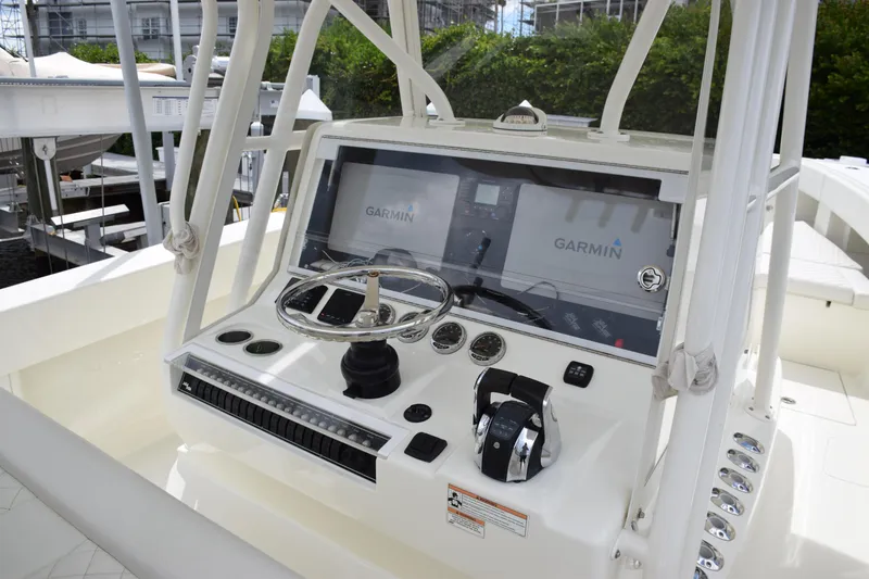 Slide: The Image of 2017 SeaVee 370z boat helm with Garmin navigation system and controls. - 25