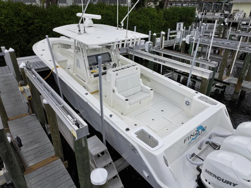 Slide: The Image of 2017 SeaVee 370z boat docked at marina, front view. - 3