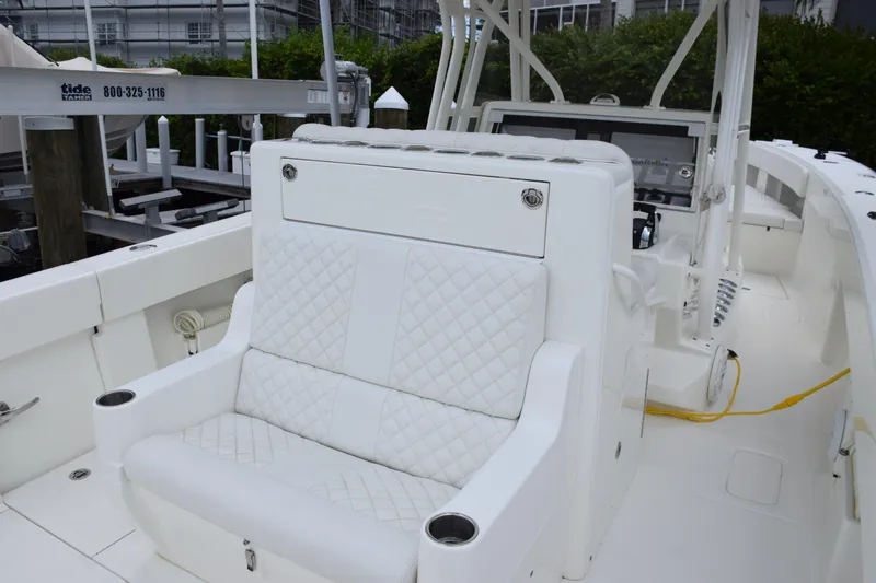 Slide: The Image of 2017 SeaVee 370z boat interior with white quilted seating. - 31