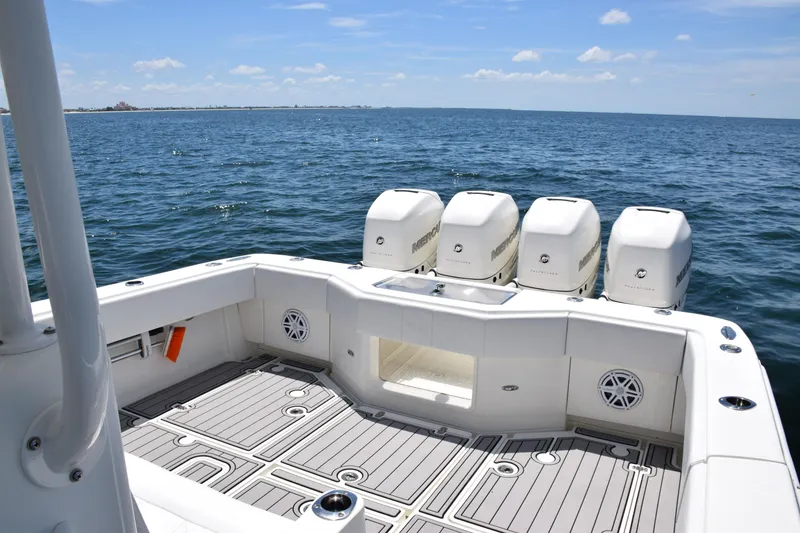 Slide: The Image of 2017 SeaVee 390Z boat with quad engines on open water. - 29