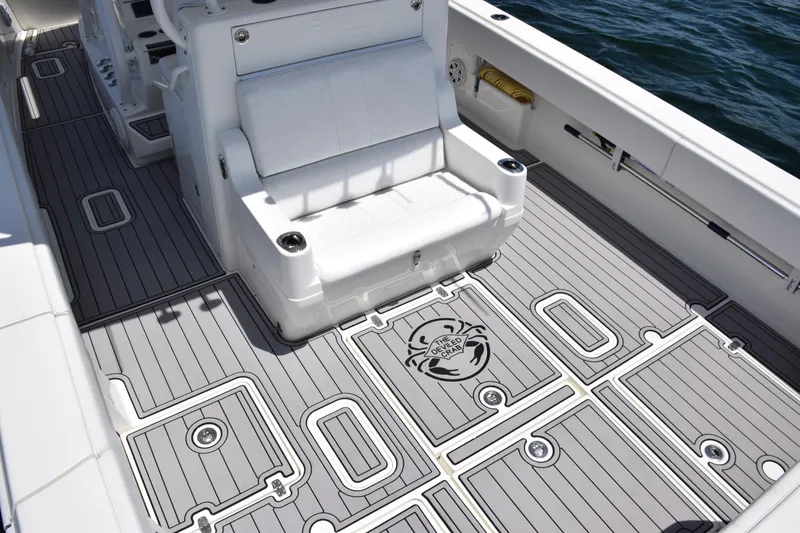 Slide: The Image of 2017 SeaVee 390Z boat interior with custom deck design and seating. - 35