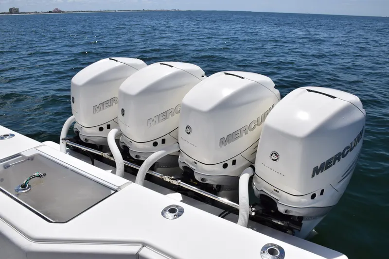 Slide: The Image of 2017 SeaVee 390Z boat with four Mercury outboard engines on open water. - 36