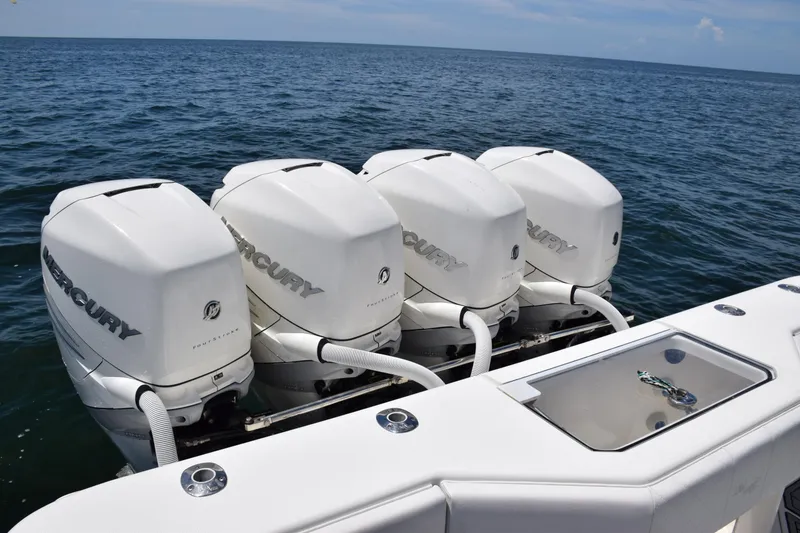 Slide: The Image of 2017 SeaVee 390Z boat with four Mercury outboard engines on open water. - 37