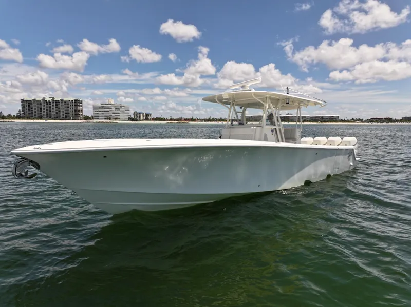 Slide: The Image of 2017 SeaVee 390Z boat on water under a partly cloudy sky. - 42