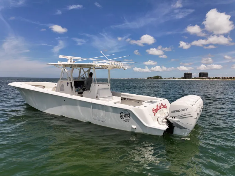Slide: The Image of 2017 SeaVee 390Z boat on water with Mercury engines, clear sky background. - 5