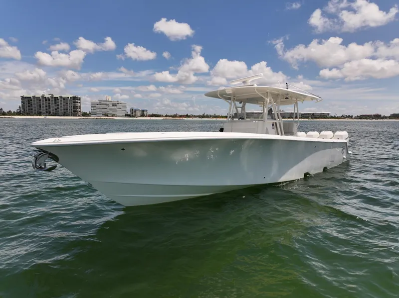 Slide: The Image of 2017 SeaVee 390Z boat on water under a partly cloudy sky. - 6