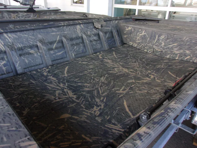 Slide: The Image of 2025 War Eagle 754 LDV boat interior with camouflage pattern. - 3