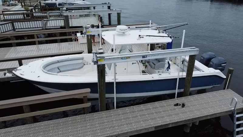 Slide: The Image of 2007 Edgewater 318CC boat docked at marina, aerial view. - 4