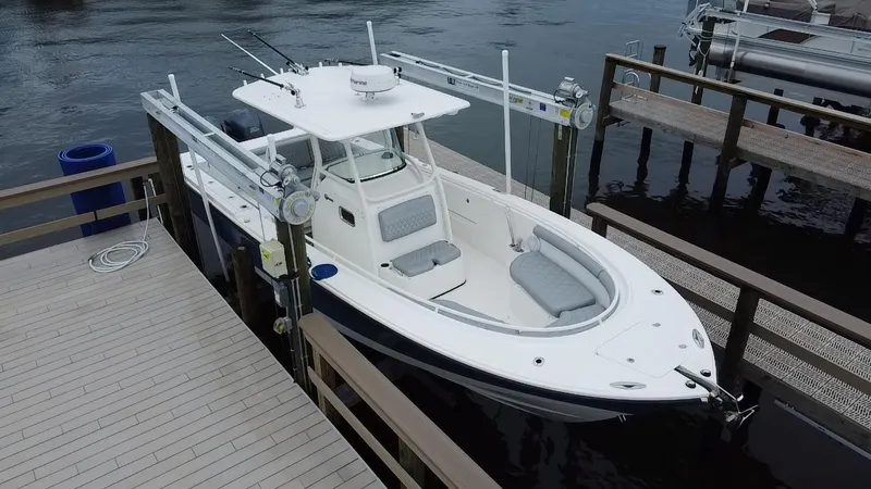 Slide: The Image of 2007 Edgewater 318CC boat docked at marina, aerial view. - 5