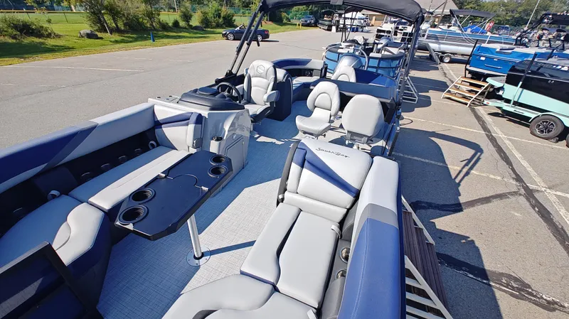 Slide: The Image of 2025 South Bay 224E 3.0 pontoon boat with luxurious seating and modern design. - 3