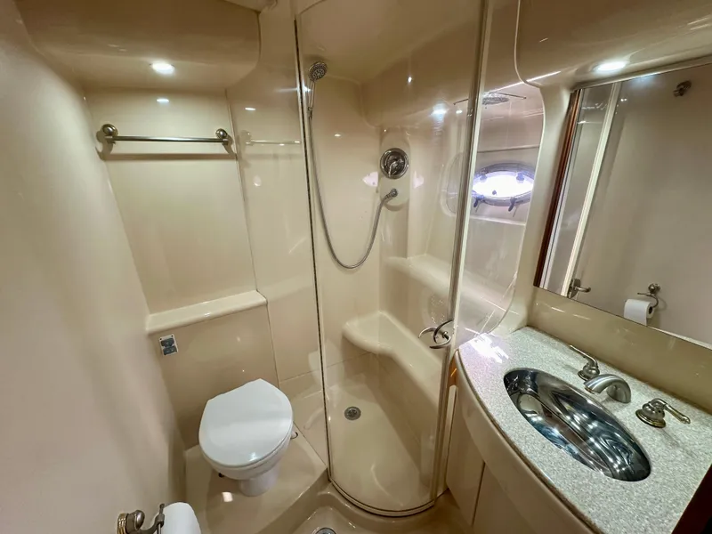 Slide: The Image of Luxurious bathroom in 2003 Meridian 411 Sedan yacht with shower and sink. - 17