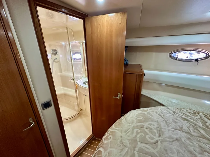 Slide: The Image of Luxurious interior of 2003 Meridian 411 Sedan yacht with bedroom and ensuite bathroom. - 21