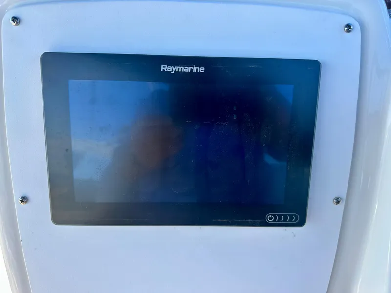 Slide: The Image of Raymarine display on 2003 Meridian 411 Sedan boat dashboard. - 42