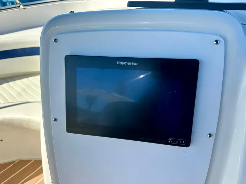 Slide: The Image of Raymarine display on 2003 Meridian 411 Sedan yacht dashboard. - 43