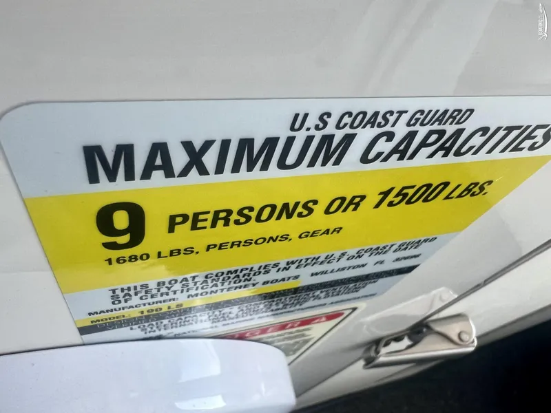 Slide: The Image of 2004 Monterey Montura 190 LS boat capacity label, 9 persons or 1500 lbs. - 9