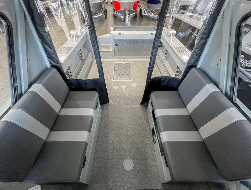 Slide: The Image of Interior of 2024 Hewescraft 210 Sea Runner ET HT with gray seating and spacious layout. - 11