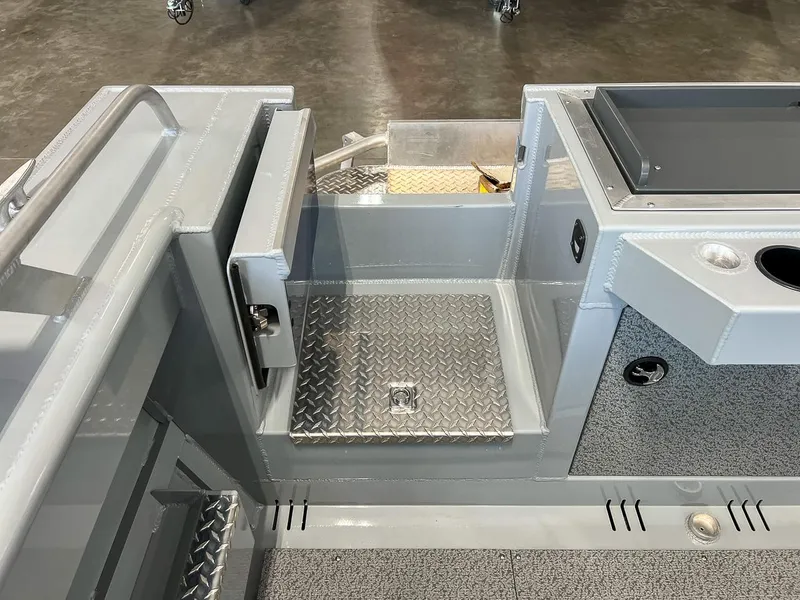 Slide: The Image of 2024 Hewescraft 210 Sea Runner ET HT interior with diamond plate flooring. - 18