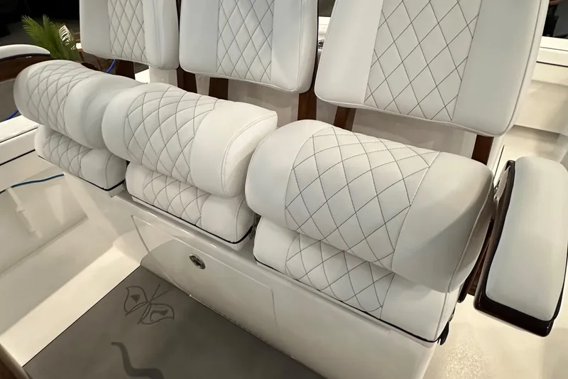 Slide: The Image of 2022 Valhalla V-33 Center Console boat with luxurious white quilted seating. - 17