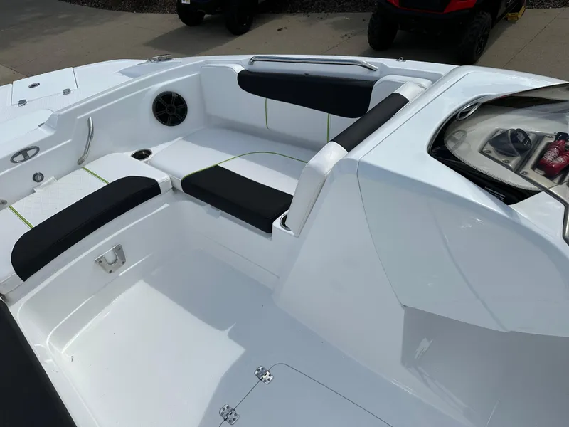 Slide: The Image of 2024 Tahoe 1950 boat interior with sleek white and black seating. - 6