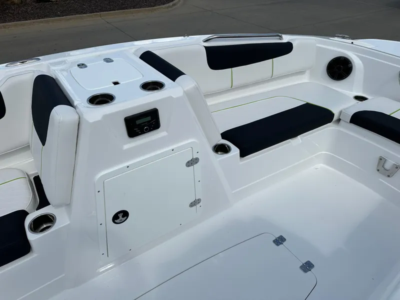 Slide: The Image of 2024 Tahoe 1950 boat interior with white seating and black accents. - 7