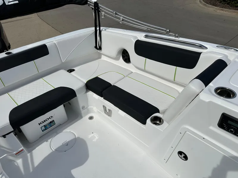 Slide: The Image of 2024 Tahoe 1950 boat interior with white and black seating. - 9