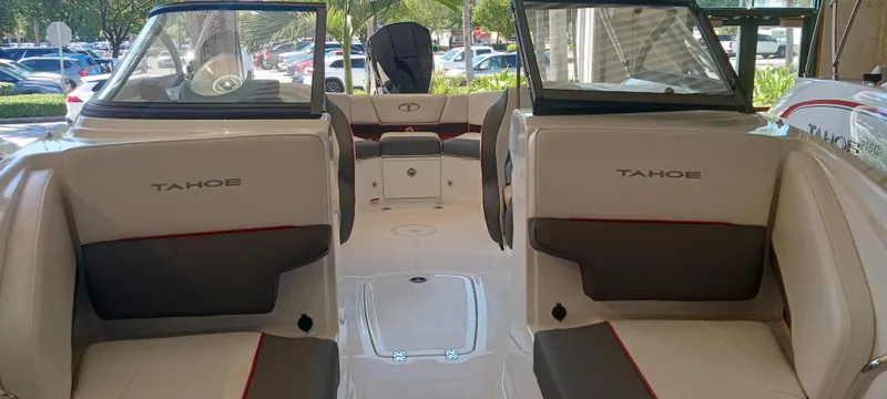 Slide: The Image of 2024 Tahoe 210 S boat interior with seating and windshield. - 4