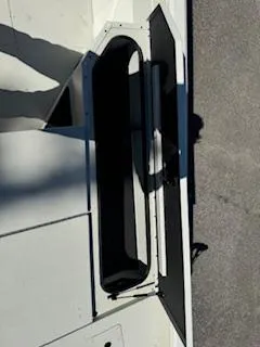 Slide: The Image of 2024 Ranger RB200 boat storage compartment, open view. - 4