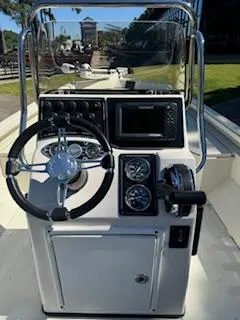 Slide: The Image of 2024 Ranger RB200 boat console with steering wheel and navigation controls. - 6