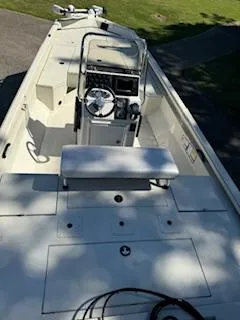 Slide: The Image of 2024 Ranger RB200 boat interior with steering console and seating. - 8