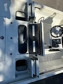 Slide: The Image of 2024 Ranger RB200 boat interior with steering wheel and storage compartments. - 9