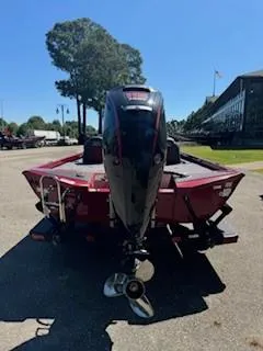 Slide: The Image of 2024 Ranger RT188P boat, rear view, parked outdoors on a sunny day. - 10