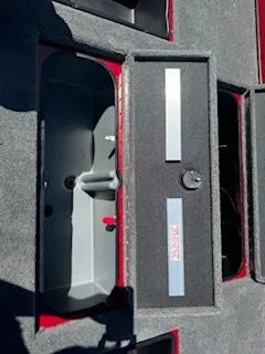 Slide: The Image of 2024 Ranger RT188P boat storage compartment with open lid. - 19