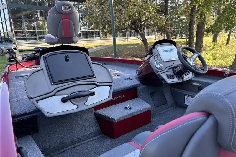 Slide: The Image of 2024 Ranger RT188P boat interior with steering wheel and seating. - 17