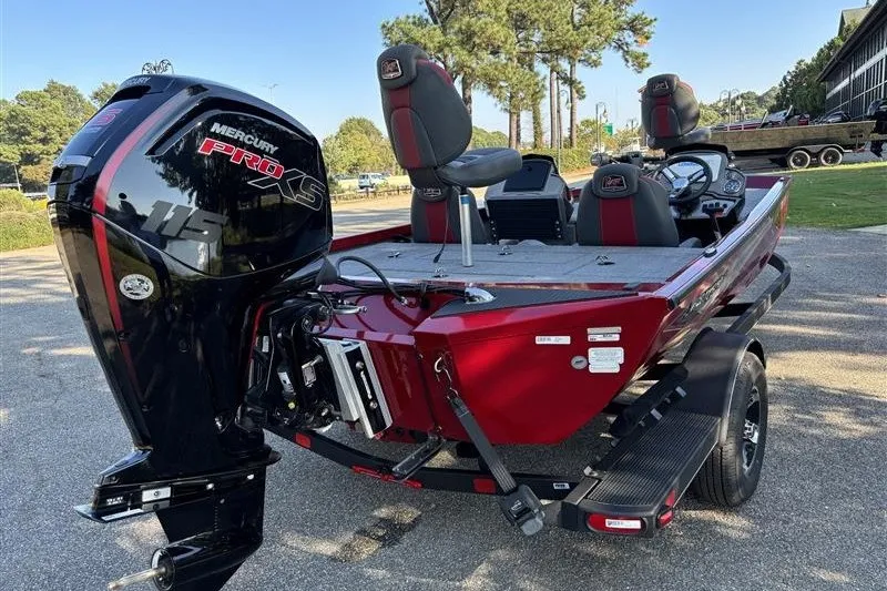 Slide: The Image of 2024 Ranger RT188P boat with Mercury Pro XS engine, parked outdoors. - 5