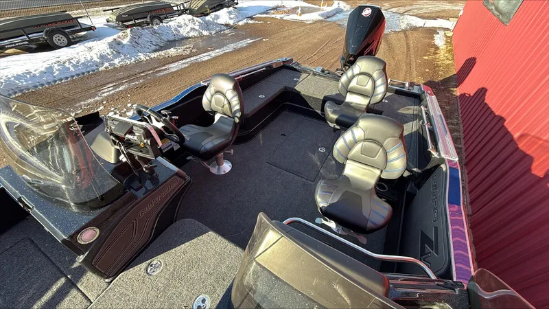 Slide: The Image of 2024 Nitro ZV20 boat interior with four seats and steering console. - 6