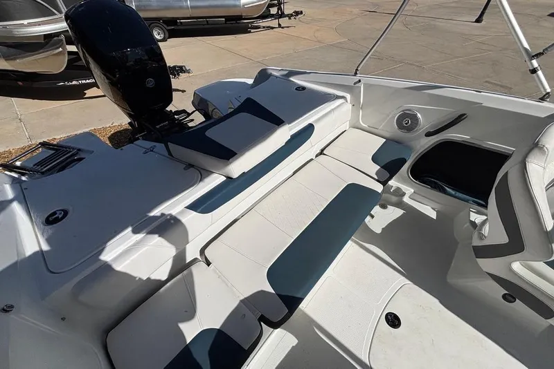 Slide: The Image of 2024 Tahoe 185 S boat interior with seating and motor, showcasing modern design and functionality. - 8