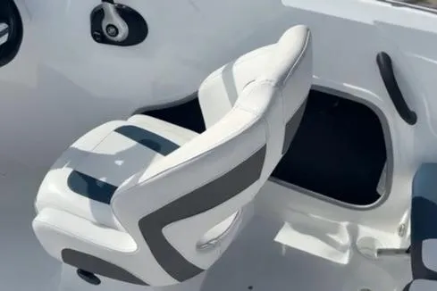 Slide: The Image of 2024 Tahoe 185 S boat seat, white with gray accents, modern design. - 10