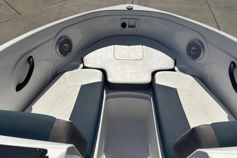 Slide: The Image of 2024 Tahoe 185 S boat interior with cushioned seating and built-in speakers. - 5