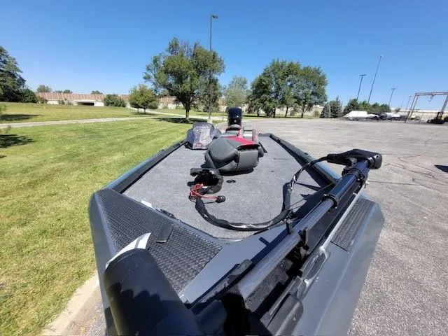 Slide: The Image of 2024 Ranger RT188C boat deck with fishing gear on a sunny day. - 4