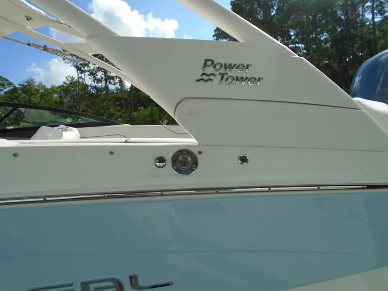 Slide: The Image of 2025 Regal LX2 boat with Power Tower feature, side view detail. - 7