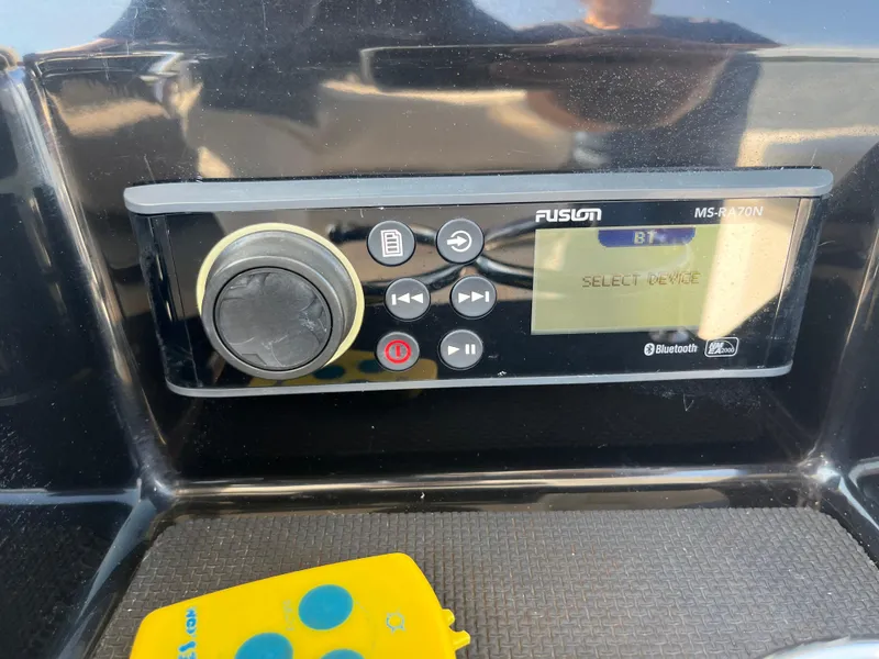 Slide: The Image of Fusion MS-RA70N stereo system on 2019 Wellcraft 262 Fisherman boat dashboard. - 22