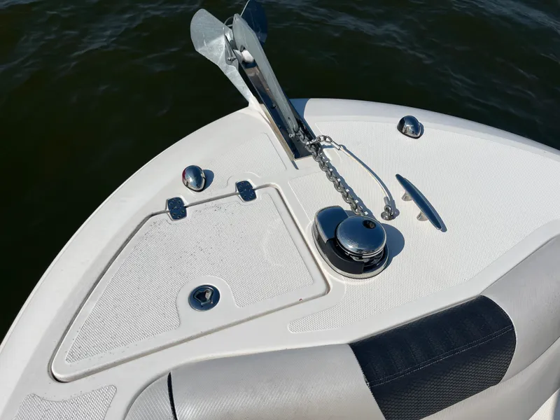Slide: The Image of Bow of 2019 Wellcraft 262 Fisherman boat with anchor and chain mechanism. - 36