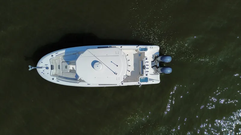 Slide: The Image of Aerial view of 2019 Wellcraft 262 Fisherman boat on water. - 5