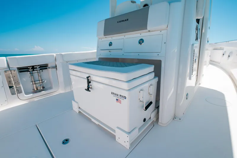 Slide: The Image of 2023 Caymas 341 CC boat interior with storage and seating. - 13