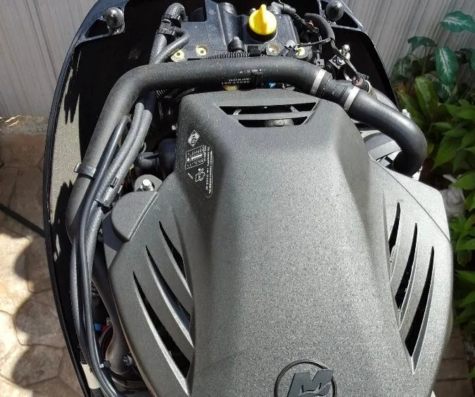 Slide: The Image of 2011 Pro-Line 23 Express engine close-up with visible components and hoses. - 4